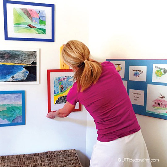 Hang art at kids’ level – not at yours!